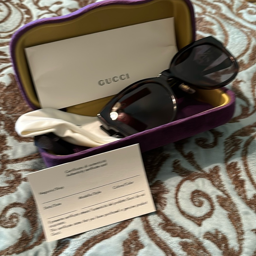 Gucci Sunglasses …